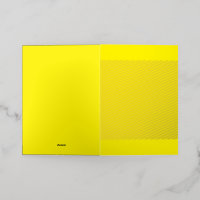 Yellow and orange abstract shapes overlap on a pla