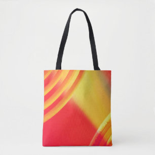 Yellow and orange circular pattern on a tote bag