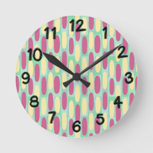 Yellow and Pink Ovals Round Clock