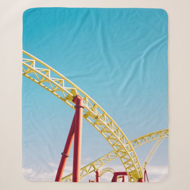 Yellow and red roller coaster under blue sky at da sherpa blanket (Front)