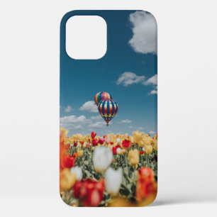 Yellow and red tulip flowers under hot air balloon iPhone 12 case
