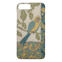 Yellow and Teal Blue Bird Perched on a Branch
