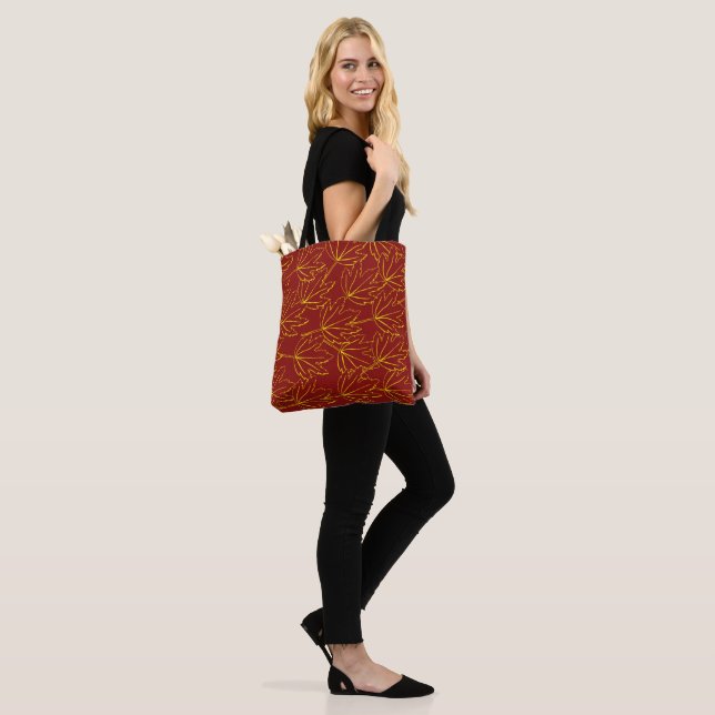 yellow autumn leaves pattern on brown tote bag (On Model)