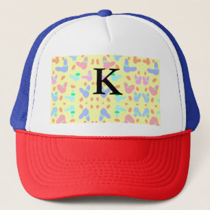 Yellow background colourful bunnies pattern add le trucker hat