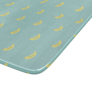 Yellow banana drawing blue pattern cutting board