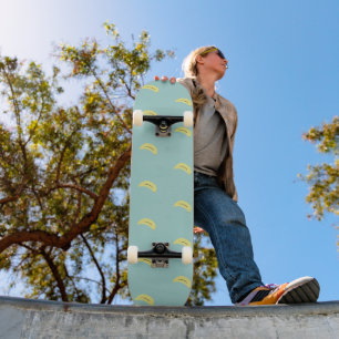 Yellow banana drawing blue pattern skateboard