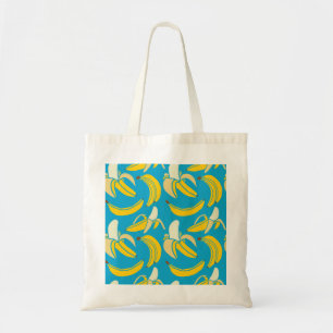 Yellow bananas, blue background pattern tote bag