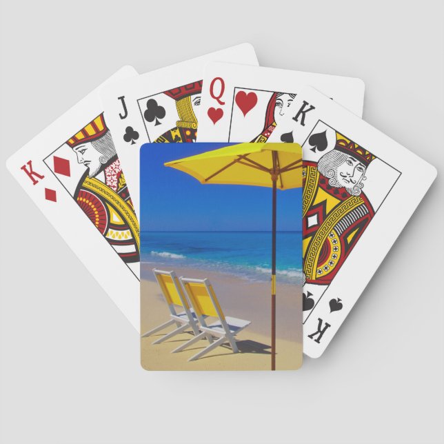Yellow beach umbrella and chairs on pristine playing cards (Back)