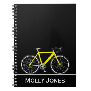 Yellow Bike with Name on Black Notebook