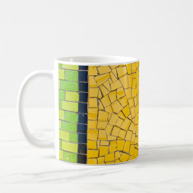 Yellow, black, and green brick wall planning coffee mug (Left)
