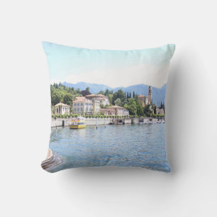 YELLOW BOAT DOCKED NEAR BUILDING CUSHION