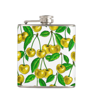 Yellow cherries on white hip flask