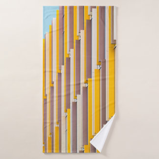 YELLOW CONCRETE BUILDING DURING DAYTIME BATH TOWEL