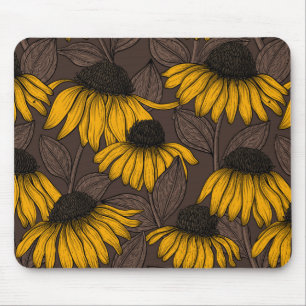 Yellow coneflowers on dark brown mouse pad
