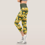 Yellow Daffodil Floral Pattern Capri Leggings<br><div class="desc">Exercise in style with these bright and cheery floral cropped leggings. The design features a pattern of yellow spring daffodils with an olive green waistband. Designed by artist ©Susan Coffey.</div>
