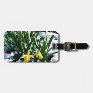 Yellow Daffodils flowers in the snow Luggage Tag