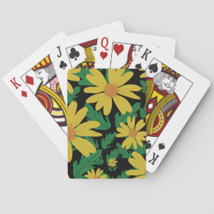 Yellow daisy flowers with green leaves  playing ca cards