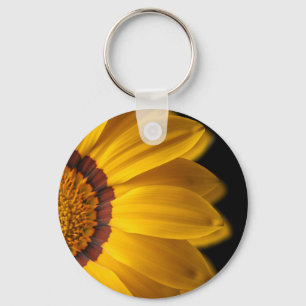 Yellow flower on black background key ring