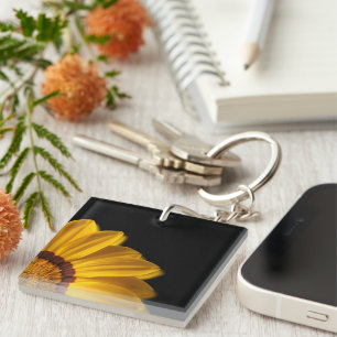 Yellow flower on  black background key ring