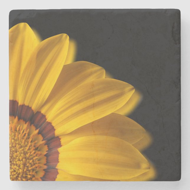 Yellow flower on  black background stone coaster (Front)