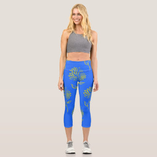 Yellow Flower Outline In A Blue Background Capri Leggings