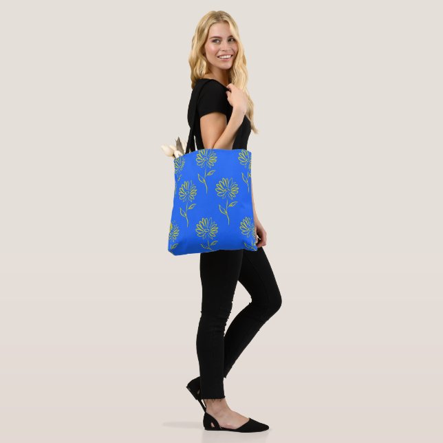 Yellow Flower Outline In A Blue Background Tote Bag (On Model)