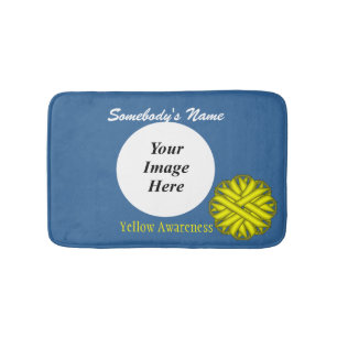 Yellow Flower Ribbon Tmpl by Kenneth Yoncich Bath Mat