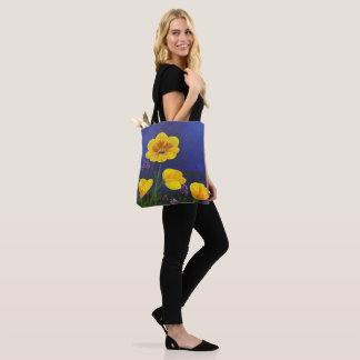 Yellow flowers on an all over print tote bag