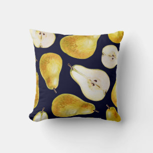Yellow-green whole ripe pear on a black background cushion