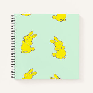 Yellow happy bunnies on teal notebook