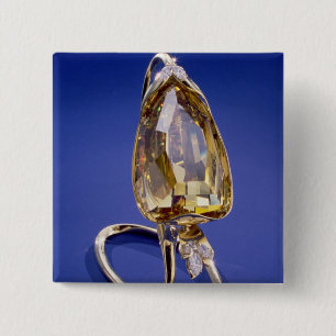 Yellow 'Incomparable' diamond in a gold setting 15 Cm Square Badge