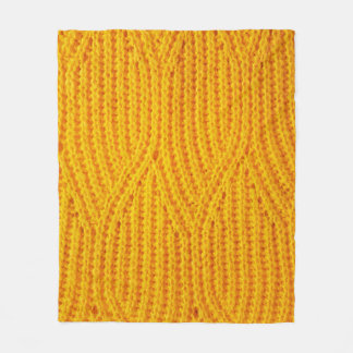Yellow knitted surface textile material background fleece blanket