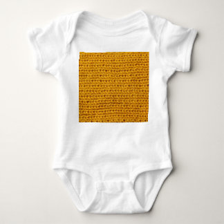 Yellow knitted wool, high-resolution texture. baby bodysuit