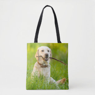 Yellow Labrador Plays Fetch With Stick Tote Bag