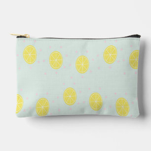 Yellow lemon slices on  blue accessory pouch