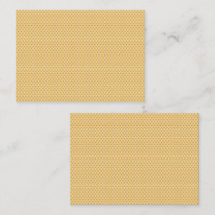 Yellow, orange, and brown sheets of wrapping paper appointment card