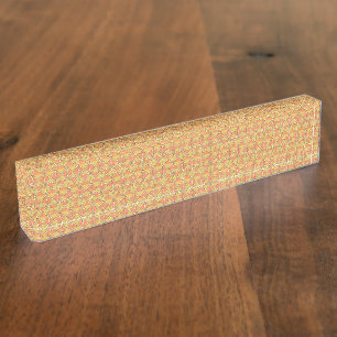 Yellow, orange, and brown wrapping paper sheets ar nameplate