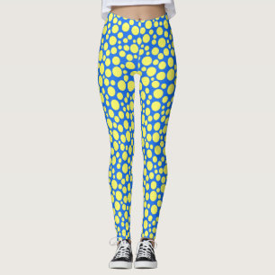 Yellow peas on a sky blue background leggings