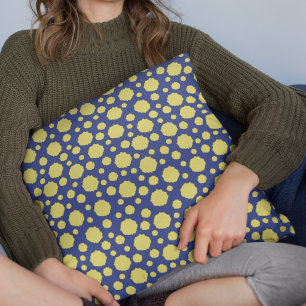Yellow polka dot geometric pattern on blue cushion