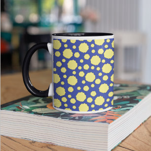 Yellow polka dot pattern on blue mug