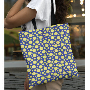 Yellow polka dot pattern on blue tote bag