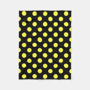 Yellow polka dots on black backgound fleece blanket