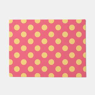 Yellow polka dots on coral doormat