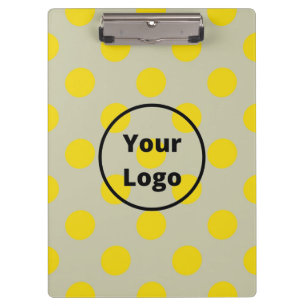 Yellow polka dots on tan clipboard