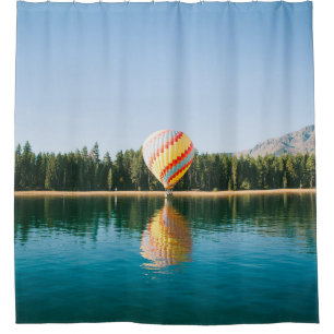 Yellow, red, and blue hot air balloon near trees a shower curtain