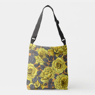 Yellow roses with grey leaves on orange crossbody bag