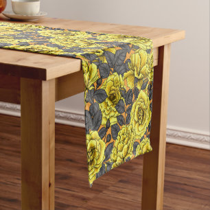 Yellow roses with grey leaves on orange short table runner