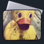 Yellow Rubber Ducky Needs a Bath! Laptop Sleeve<br><div class="desc">Cute and funny photo of a big yellow rubber ducky sitting on a wooden porch. This duck, has a big red beak and wide staring eyes. Covered in dirt, perhaps waiting for the rain shower to wash away the dirt. Has a cute look on his face.</div>