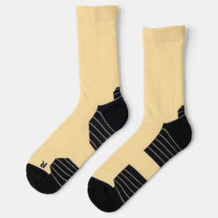 yellow socks with black toes and heels