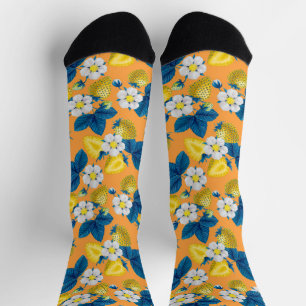 Yellow strawberries on orange socks